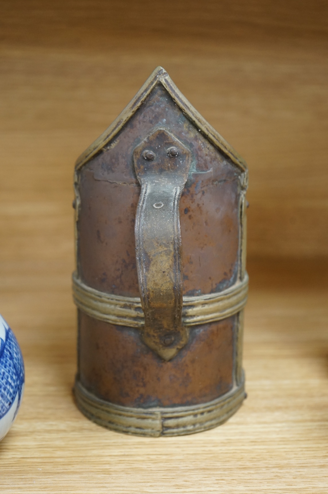 A Chinese blue and white bottle vase, a crackle glaze vase and a Tibetan copper and brass ‘monk’ cap’ ewer (3), tallest 21cm